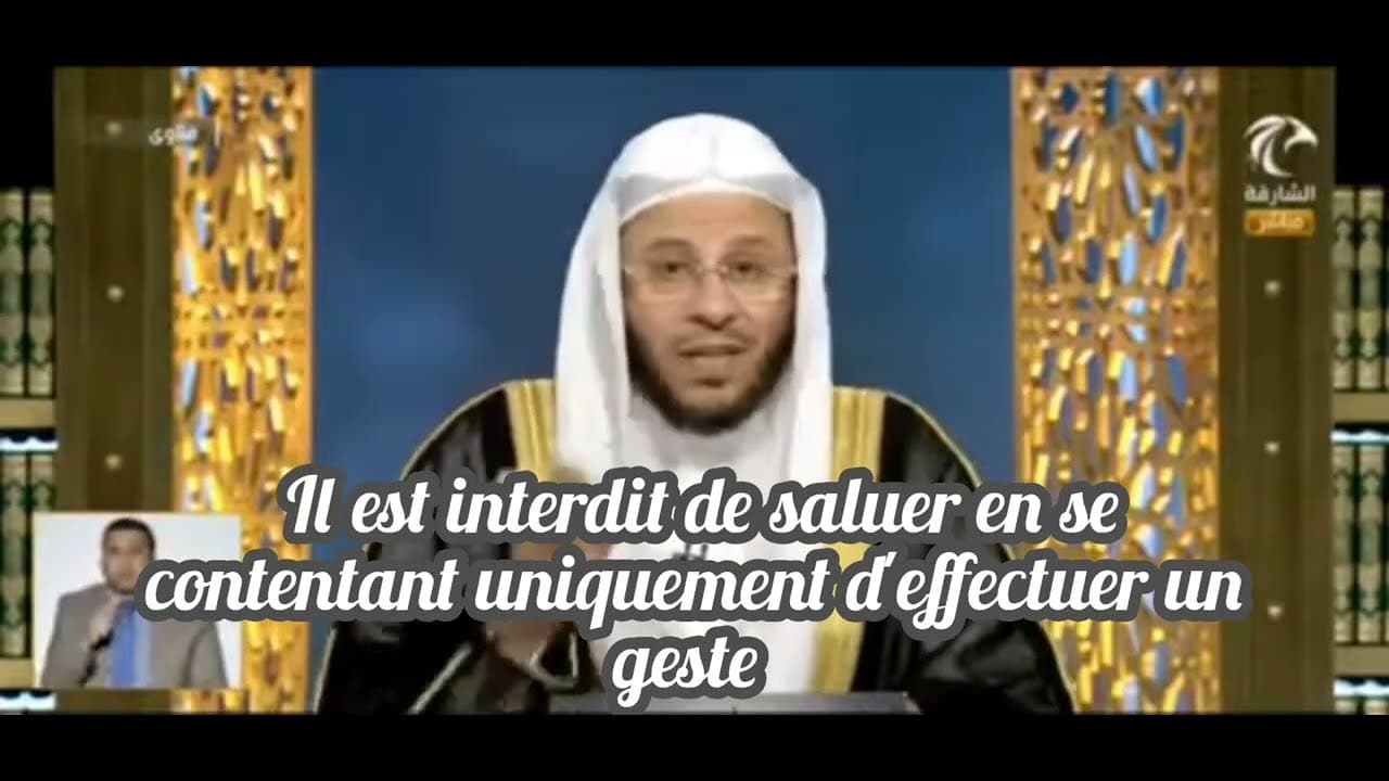 Saluer en faisant un geste de la main.Cheikh 'Aziz Farhan Al 'Anzi
